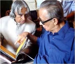 Dr Kalam showing the great R K Lakshman his book The Luminous Sparks. punyapublishing.com/general-books/  